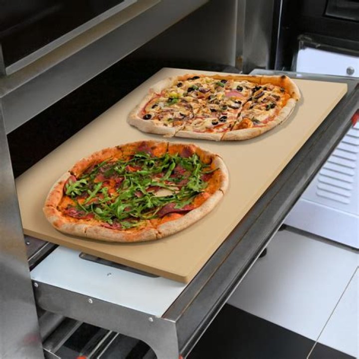 Can I put a pizza pan on a pizza stone?