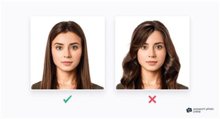 Can you wear your hair down in a passport photo?