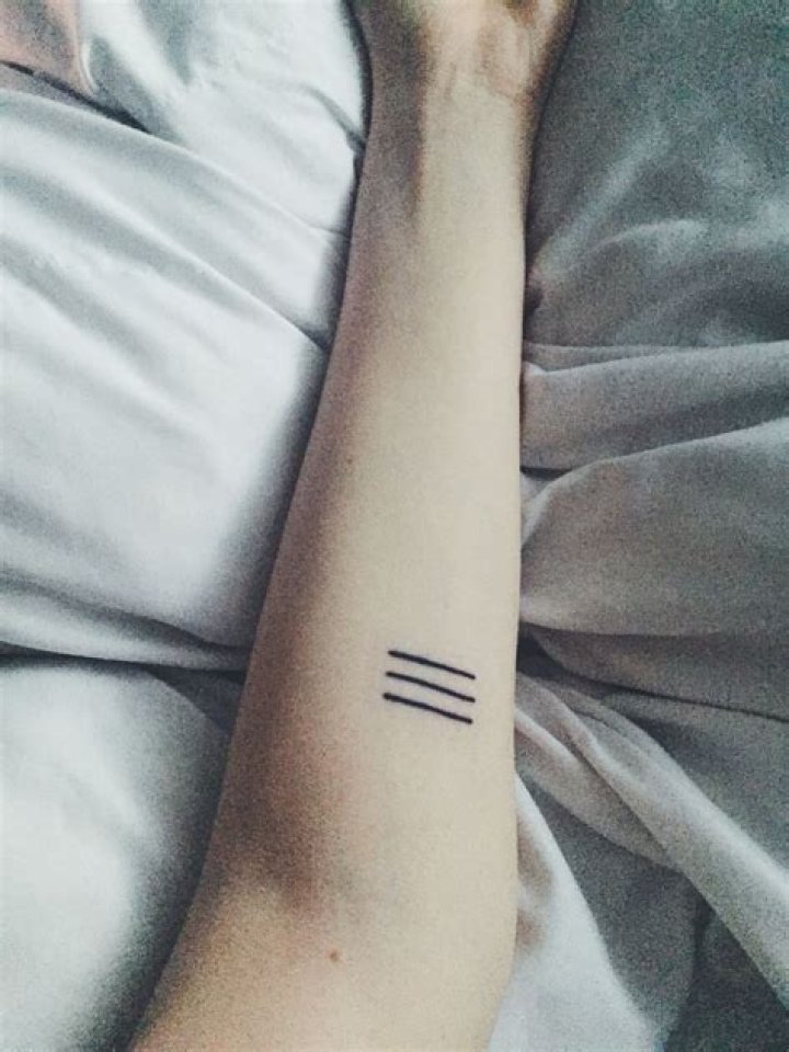 What does 3 lines tattoo on chin mean?