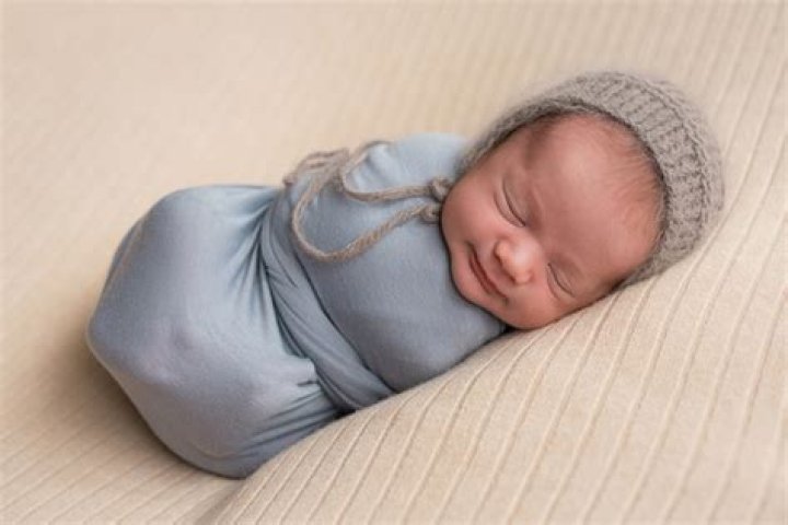 Why do babies laugh while sleeping?