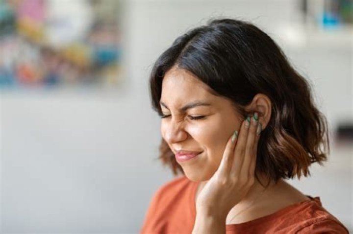 Why do ears ring before passing out?