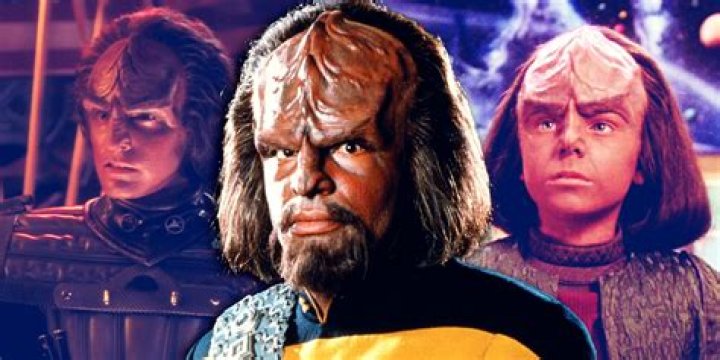 Why does Worf wear red uniform?